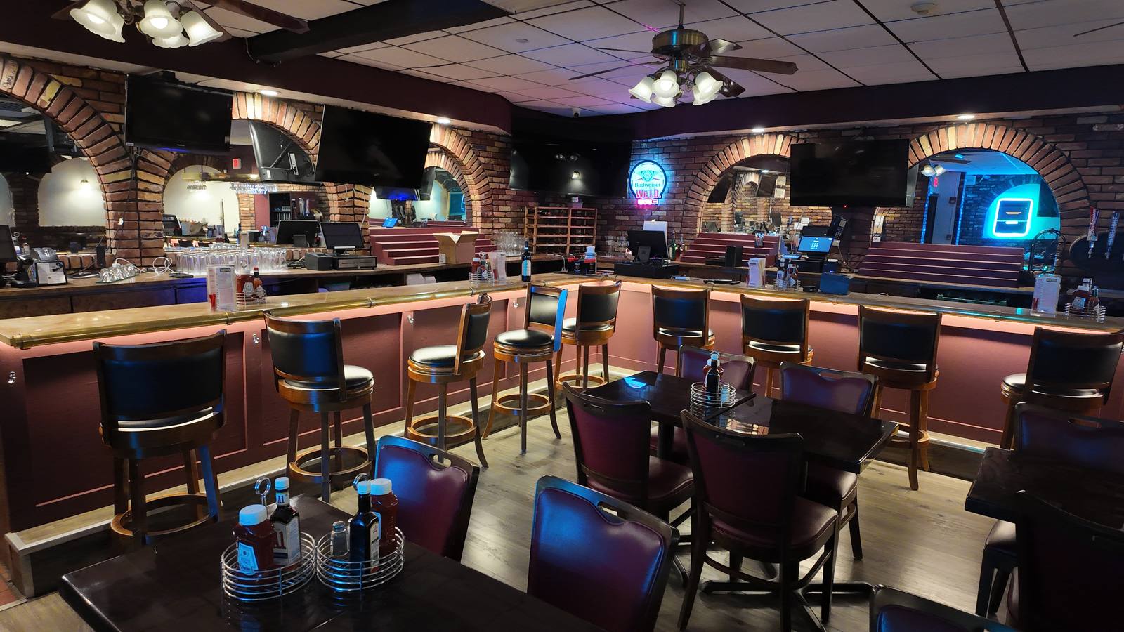 The brick-arched bar and dining room at Little Venice in Norwood